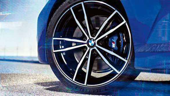 BMW 3er Limousine, M Sportbremse. Detailansicht des Rades der BMW 3er Limousine mit M Sportbremse.