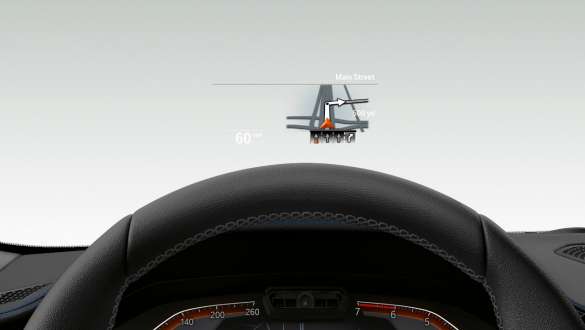 BMW 3er Limousine, BMW Head-Up Display. Frontale Nahaufnahme des halben Lenkrades und der Frontscheibe der BMW 3er Limousine mit BMW Head-Up Display.