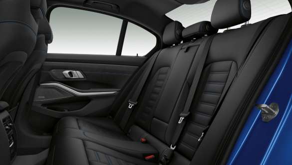 BMW 3er Limousine, Sitzheizung. Seitliche Nahaufnahme der hinteren Sitzreihe mit Sitzheizung vorn und hinten.