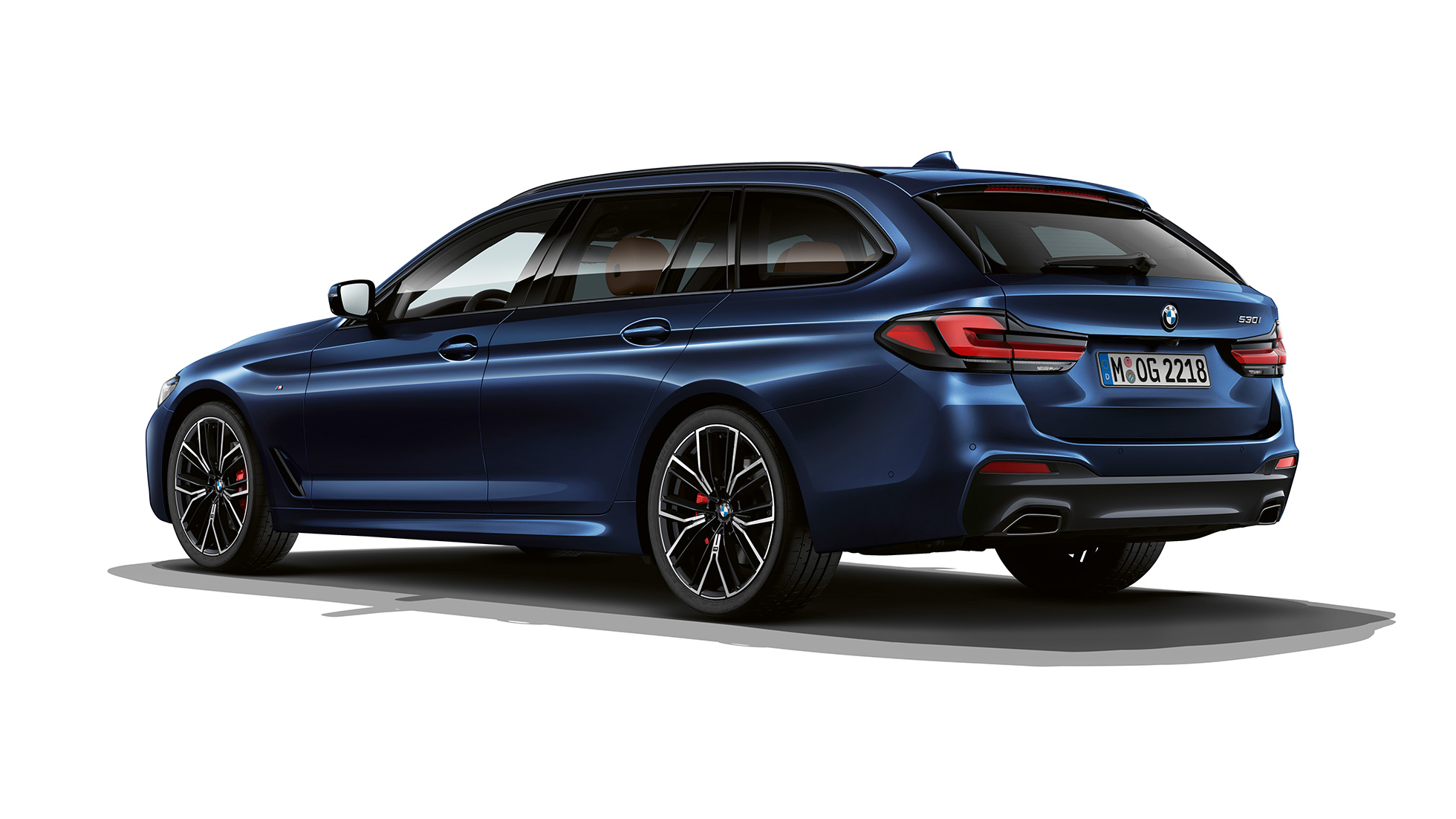 BMW 5er Touring G31 M Sportpaket Heck BMW 5er Touring 530e G31 2020 M Sportpaket in Tansanitblau II metallic Dreiviertel-Heckansicht