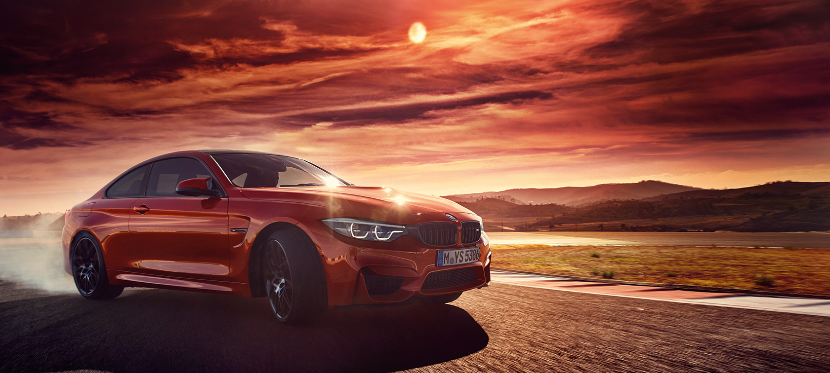 BMW M4 Coupé BMW M4 Coupé, seitliche Ansicht bei Kurvendrift