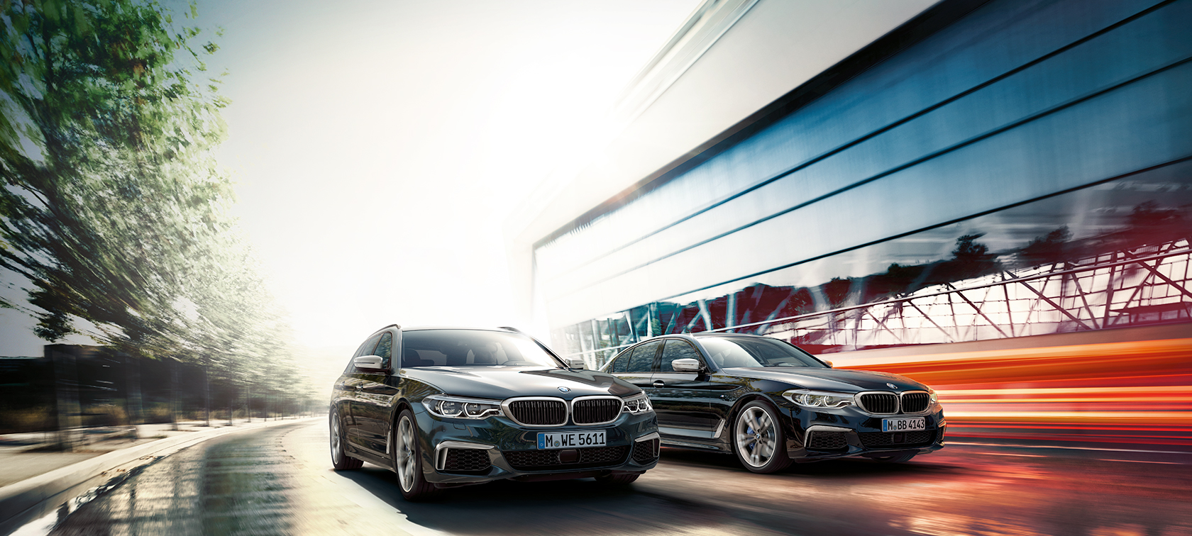 BMW M550d xDrive Touring Azuritschwarz metallic BMW M550d xDrive Touring G31 Azuritschwarz metallic Dreiviertel-Seitenansicht