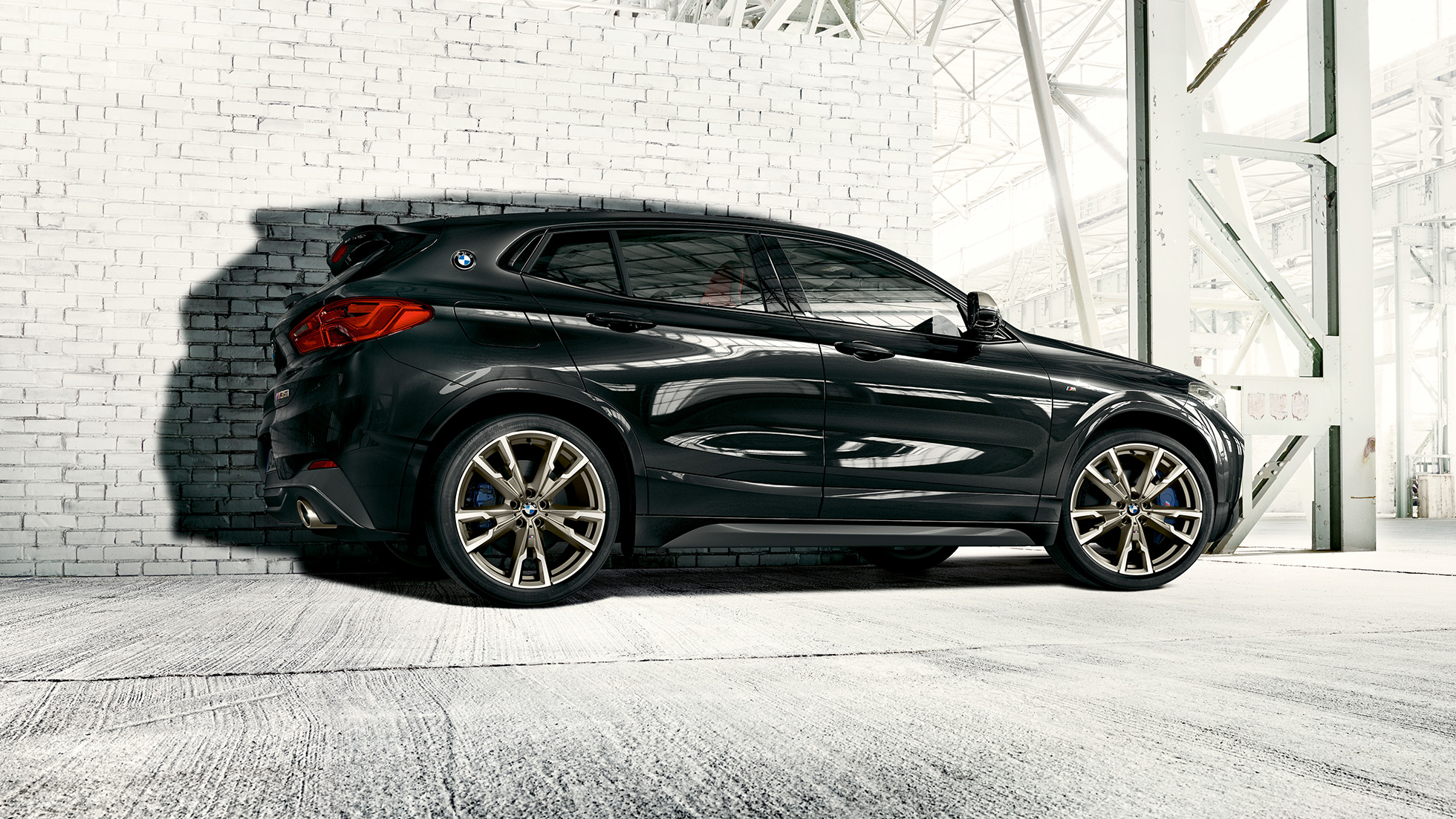 Exterieur BMW X2 M35i Exterieur BMW X2 M35i Saphirschwarz metallic F39 Seitenansicht