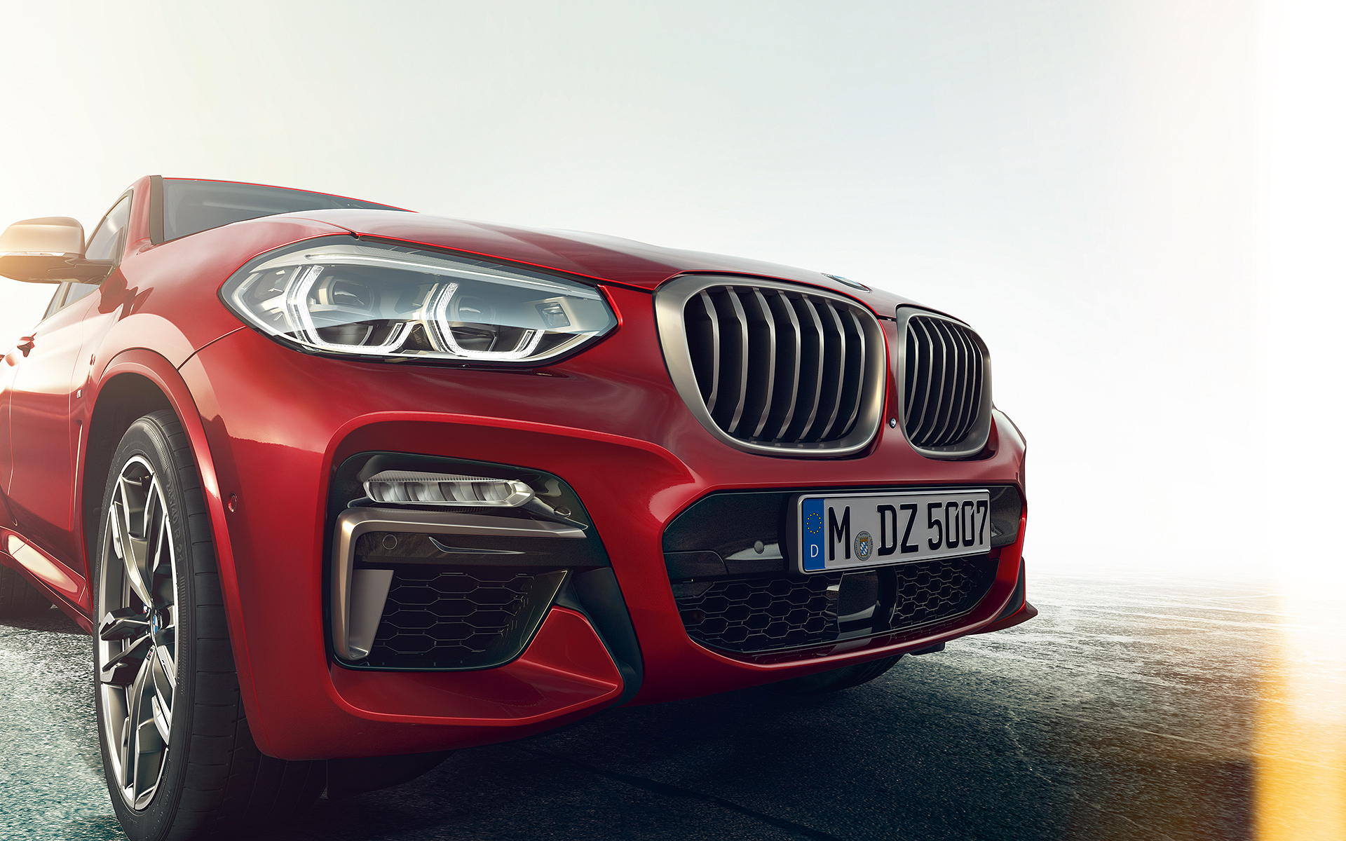 BMW X4 rot - Vorderansicht - Scheinwerfer und Kühlergrill BMW X4 rot - Vorderansicht - Scheinwerfer und Kühlergrill