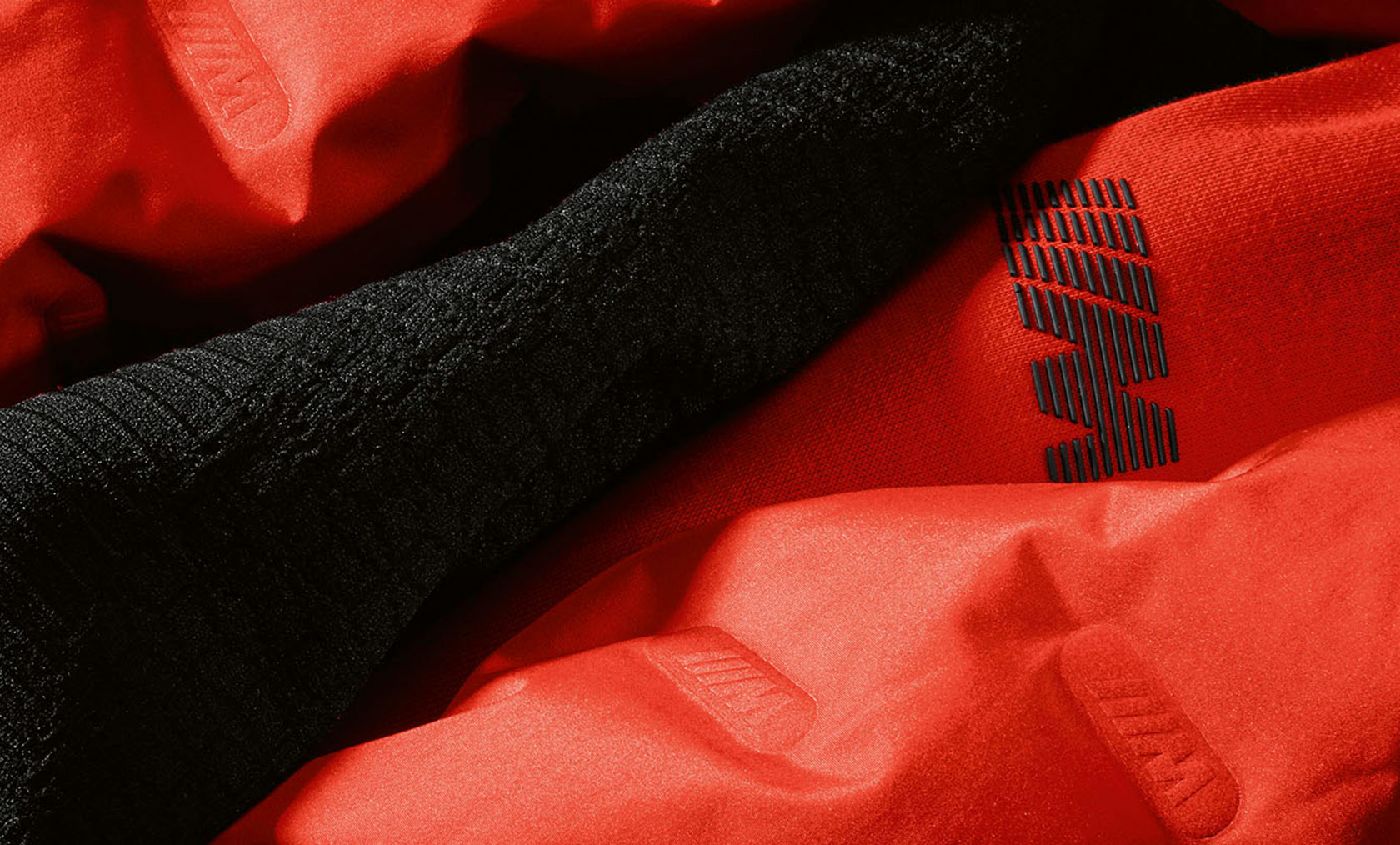 BMW M Jacke Damen. Das Bild zeigt eine Detailaufnahme der BMW M Jacke für Damen.